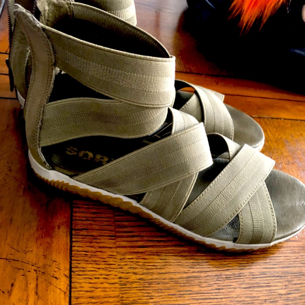 Sorel green stretchy sandals- so comfy!  Worn a few times only